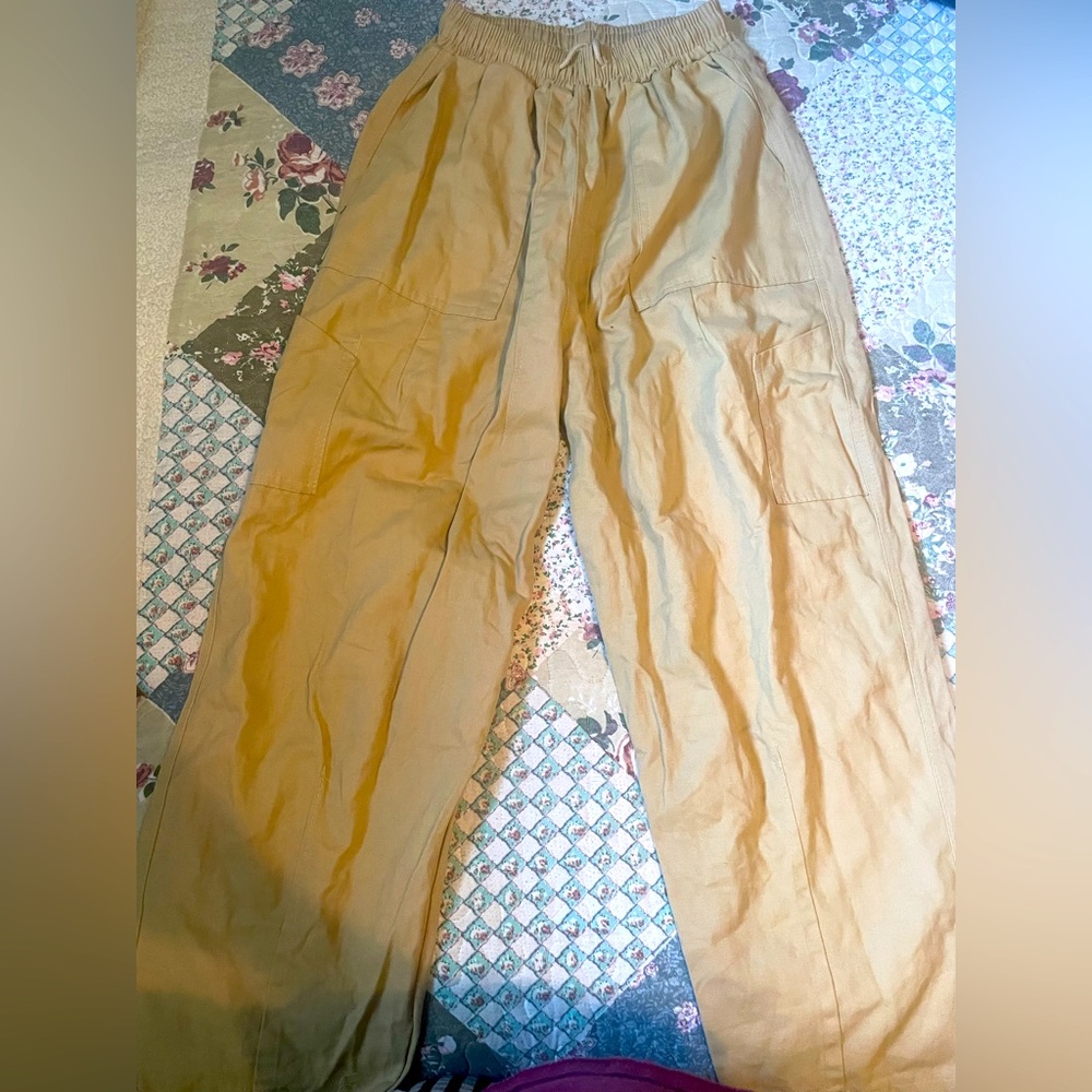 flared beige pants, small size, cargo in a way,